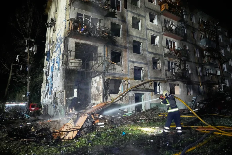 Russia hits Ukrainian capital with ballistic missiles and drones killing 3 and wounding over a dozen
