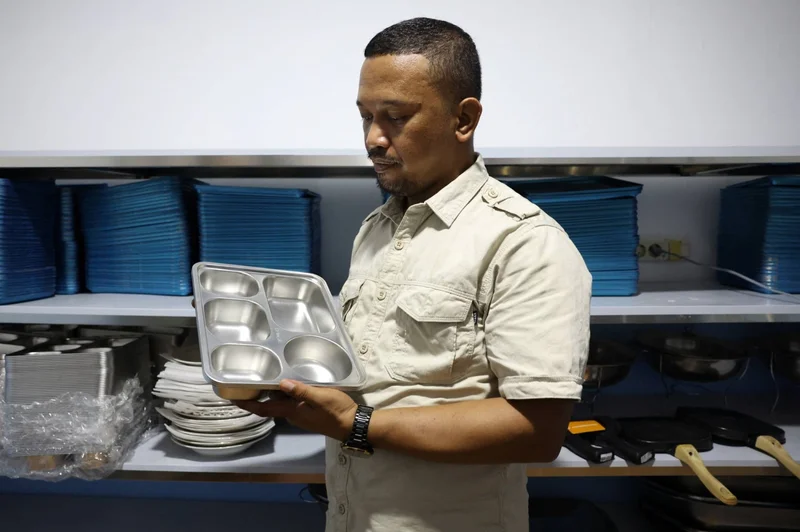 Indonesia’s flagship free meals initiative leaves kitchen investors deep in debt