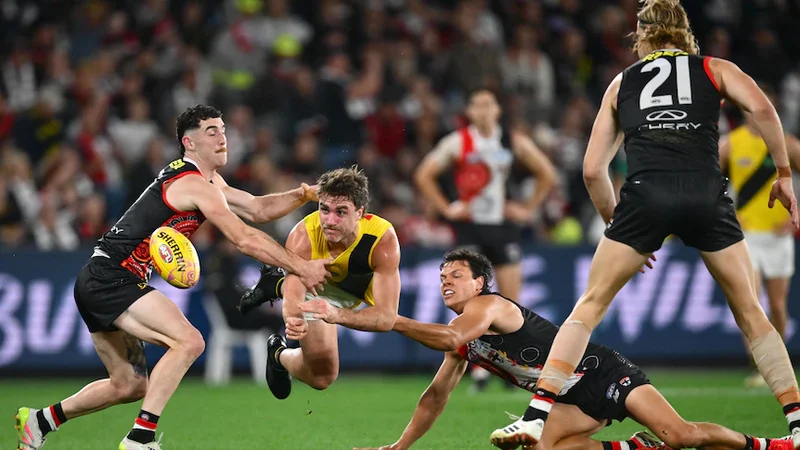 Live: Tigers–Saints starts big day of footy, ahead of Q-Clash, Hawks–Pies