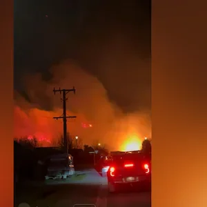Albert Town residents flee homes from huge scrub fire, fanned by winds