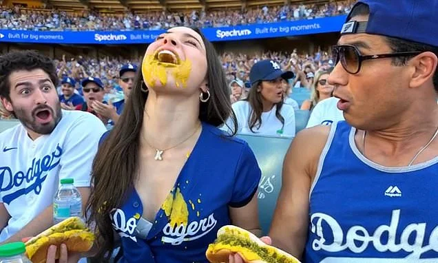 Mario Lopez raises eyebrows after sharing bizarre AI video of his niece, 20, devouring two hot dogs at baseball game