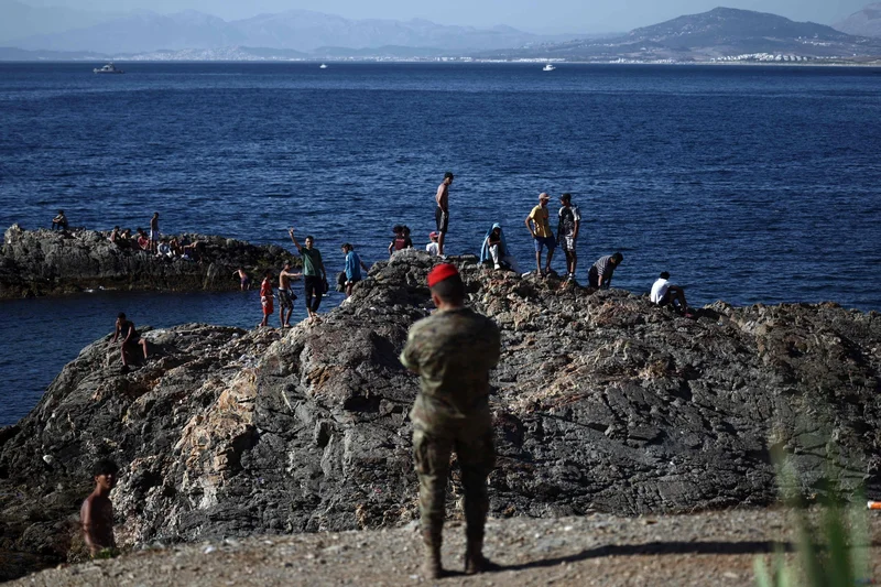 Ceuta migrant rush deaths hit 72 as Spain erects floating barrier