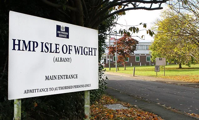 Female prison psychologist sent topless photos of herself to inmate and called him 'my rock' in birthday card