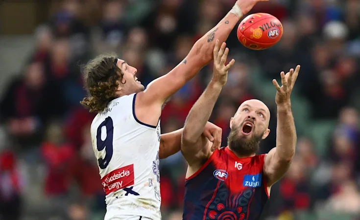 AFL LIVE: Dockers and Demons engage in 21-goal first-half shootout in MCG classic